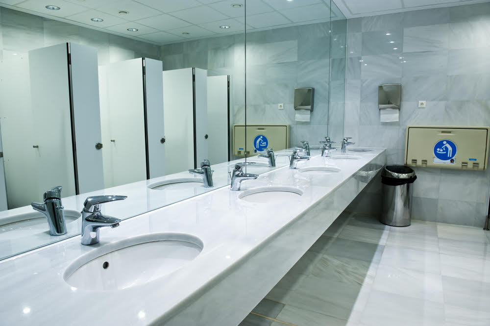 Sparkling clean office restroom with sanitized surfaces