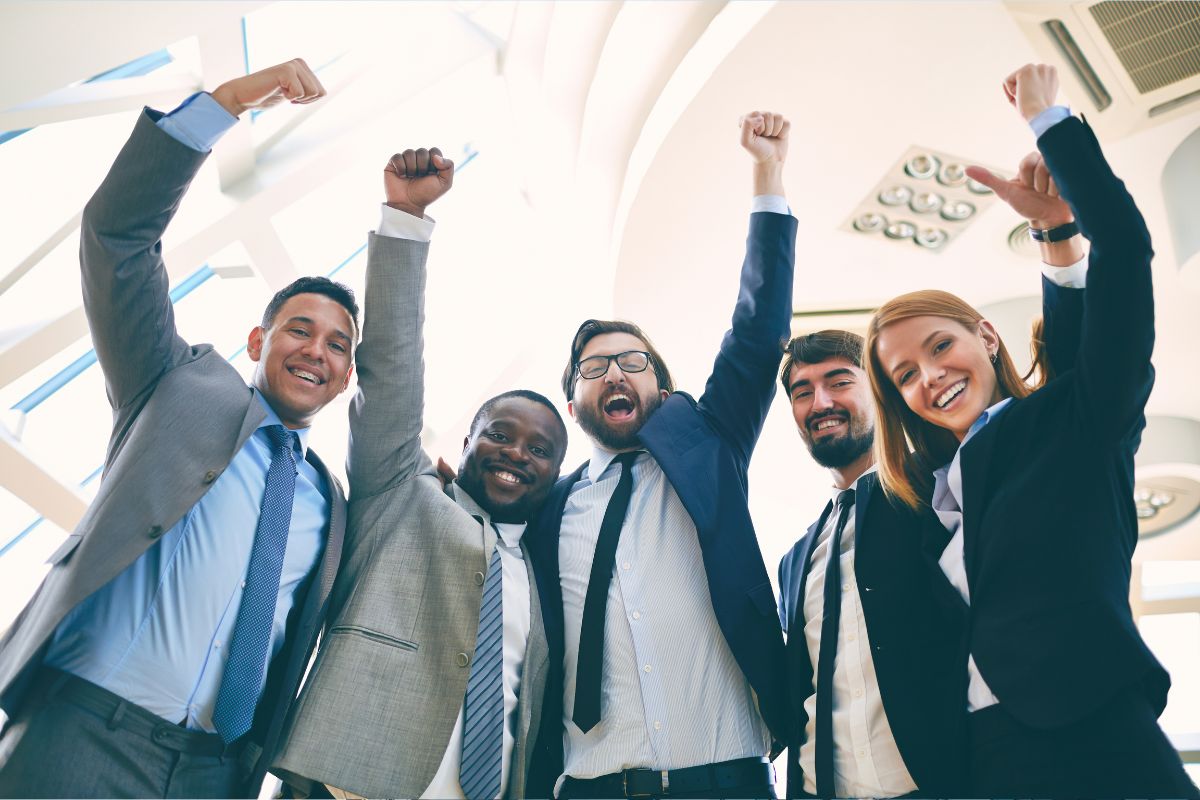 professional office cleaning services - Happy team working in a clean and comfortable office space