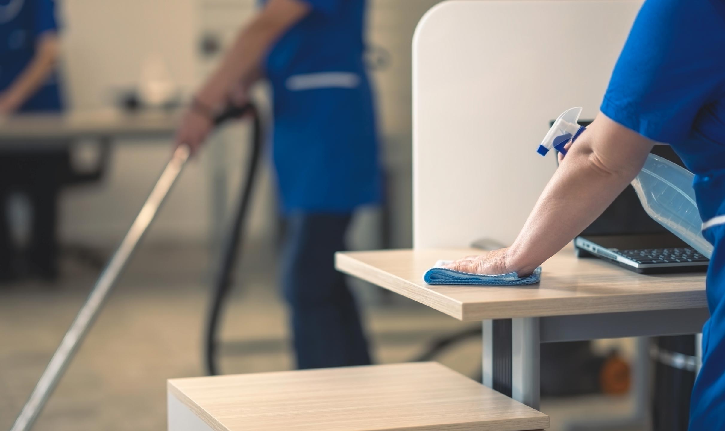 Commercial Cleaning Services ROI - Employees working productively in clean office maintained by commercial cleaning services Dayton/Cincinnati