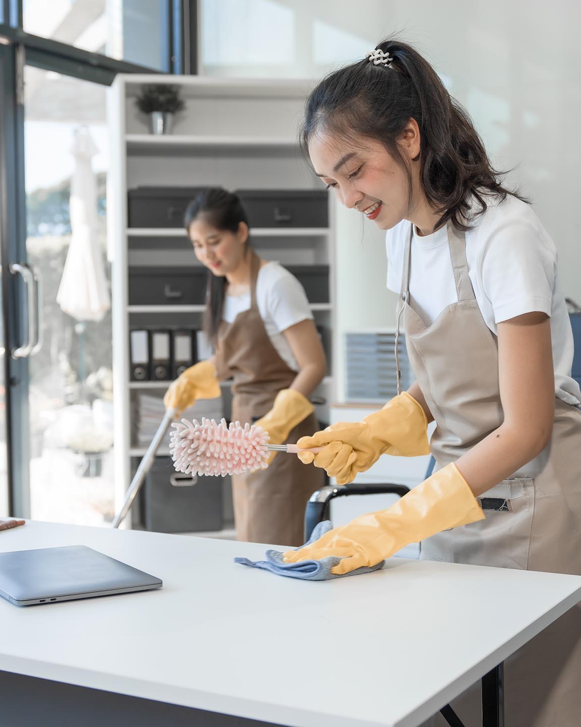 Why Smart Businesses Are Outsourcing Janitorial Services in 2026 - Professional janitorial services team cleaning commercial office building in Dayton Ohio